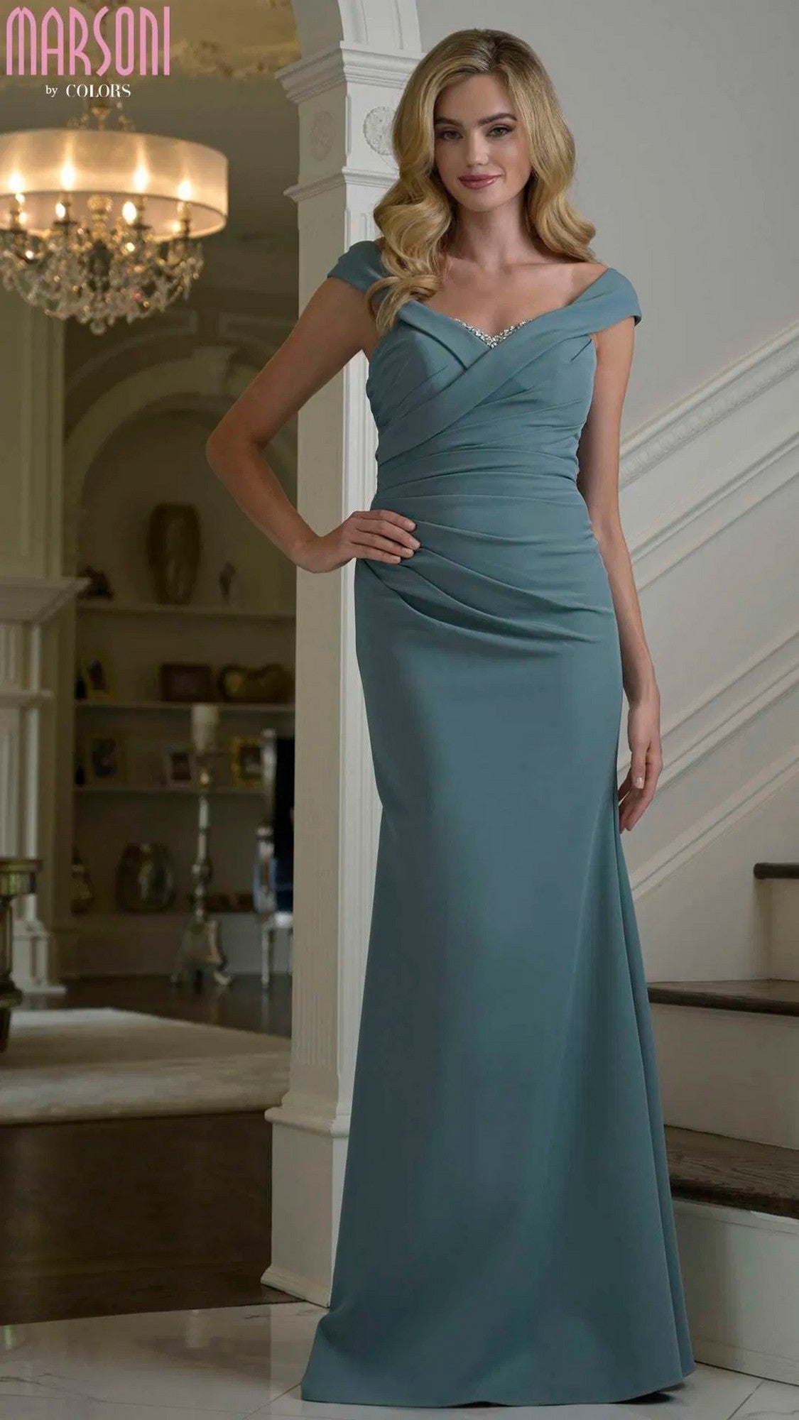 A woman in a stunning deep sage off-the-shoulder long formal dress, Marsoni M342.